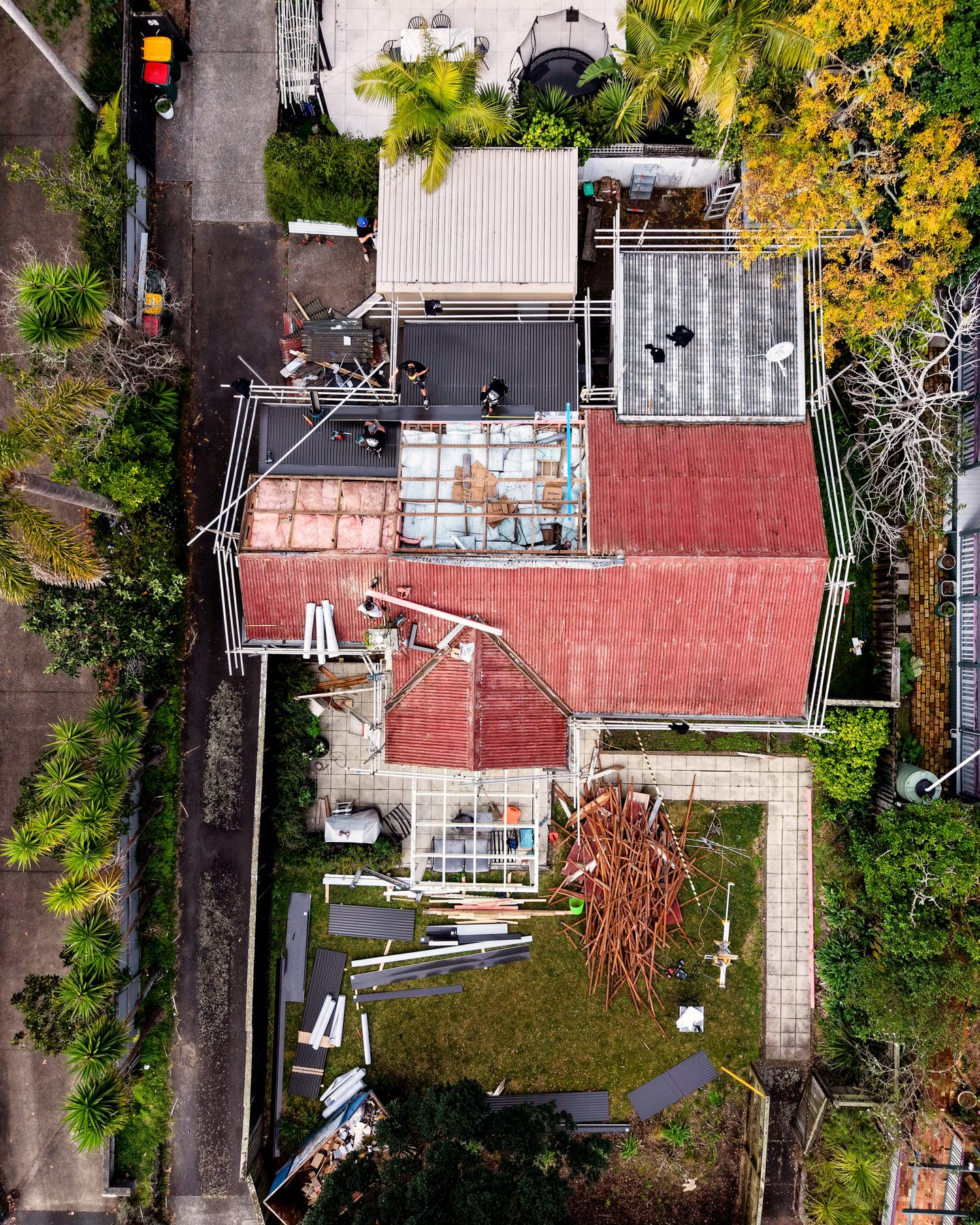 Aerial view mid-renovation during roof removal