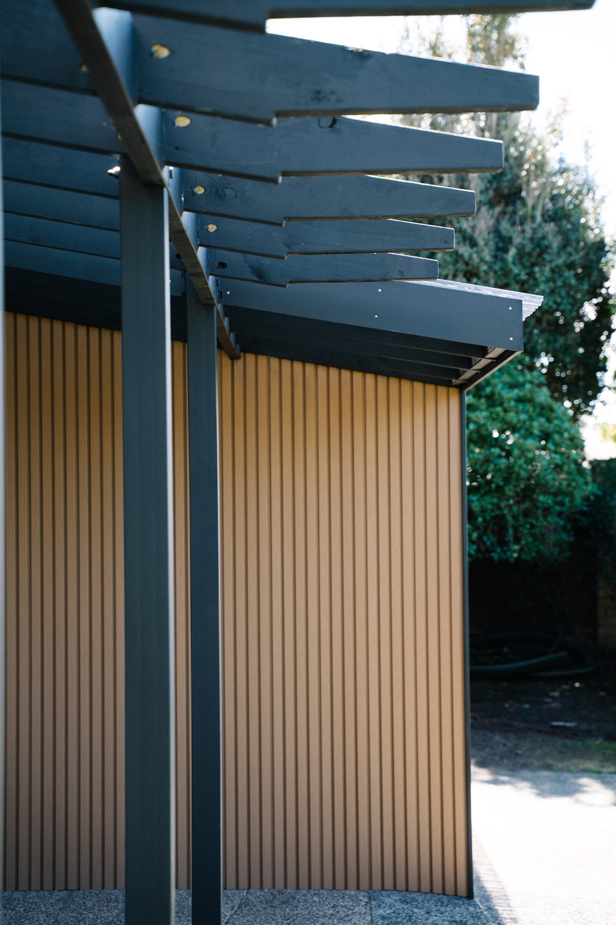 Finished pergola batten detail against the cladding