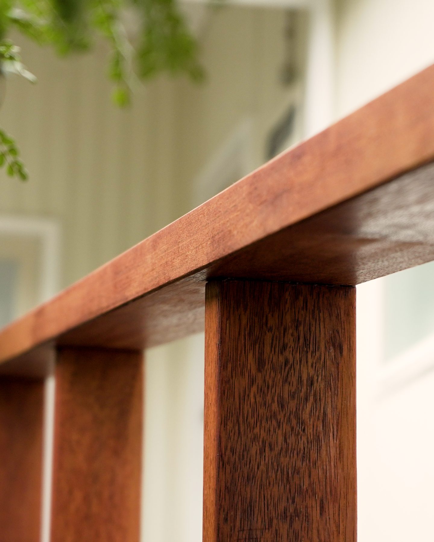 Detail of the pergola's crossed timber beams