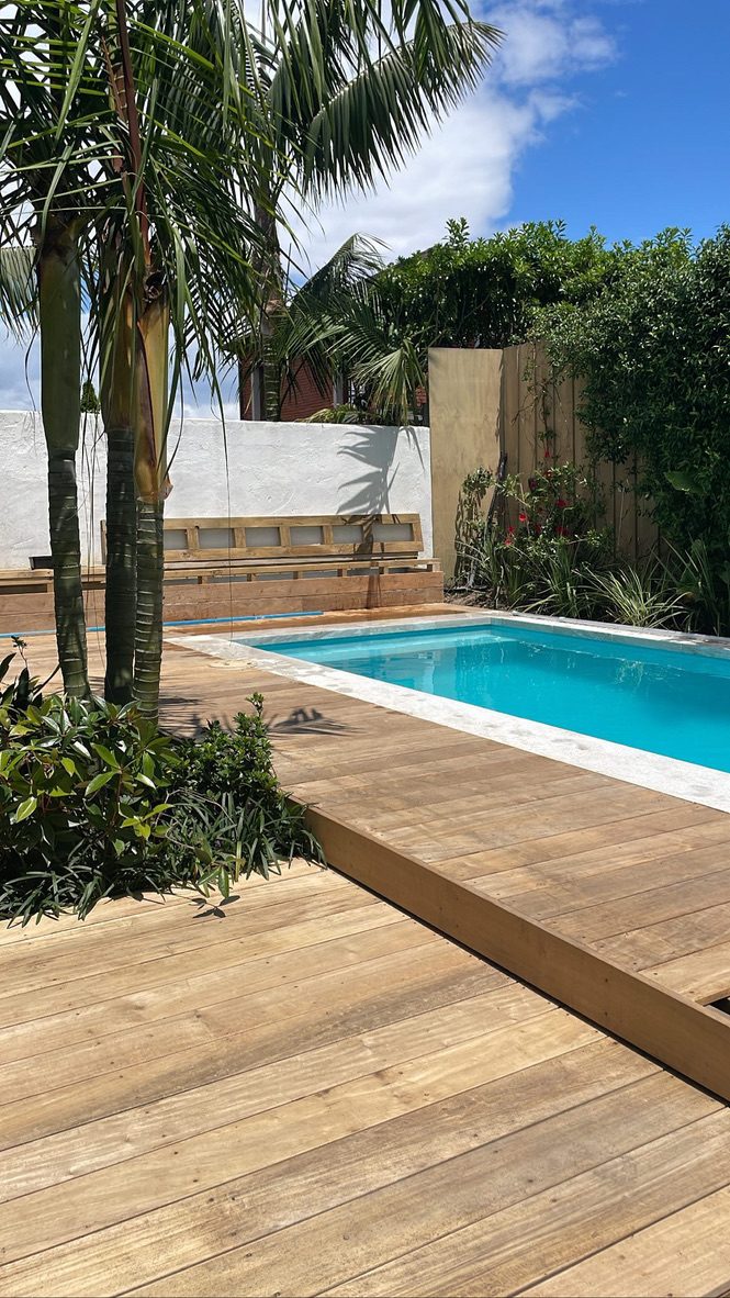 Finished pool and timber deck in the same backyard